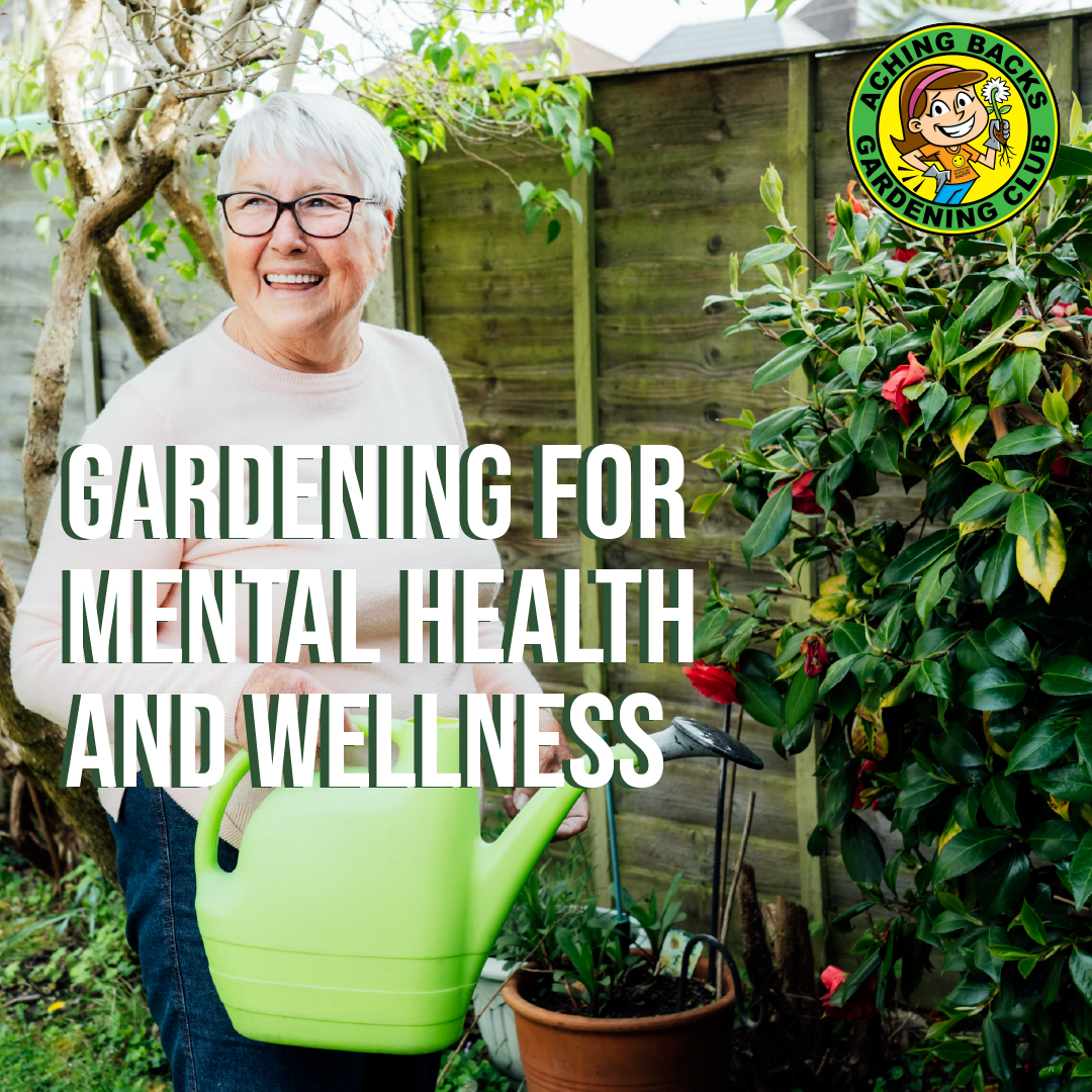 mature woman smiling while holding a green watering can in a garden